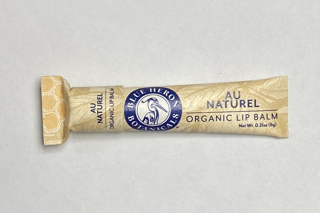 An Au Naturel tube of Blue Heron Botanicals Lip Balm.